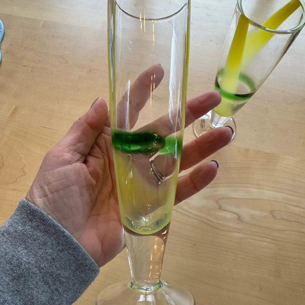Elegant Glass Champagne Flutes with Yellow and Green Design